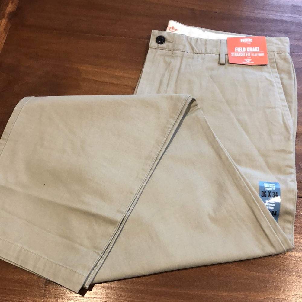 Dockers field khaki pants. Flat front, straight leg. Size 36x34. Tan color. NWT!